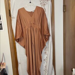 Grecian style drape dolman sleeve burnt orange dress front slit by Fashion Nova